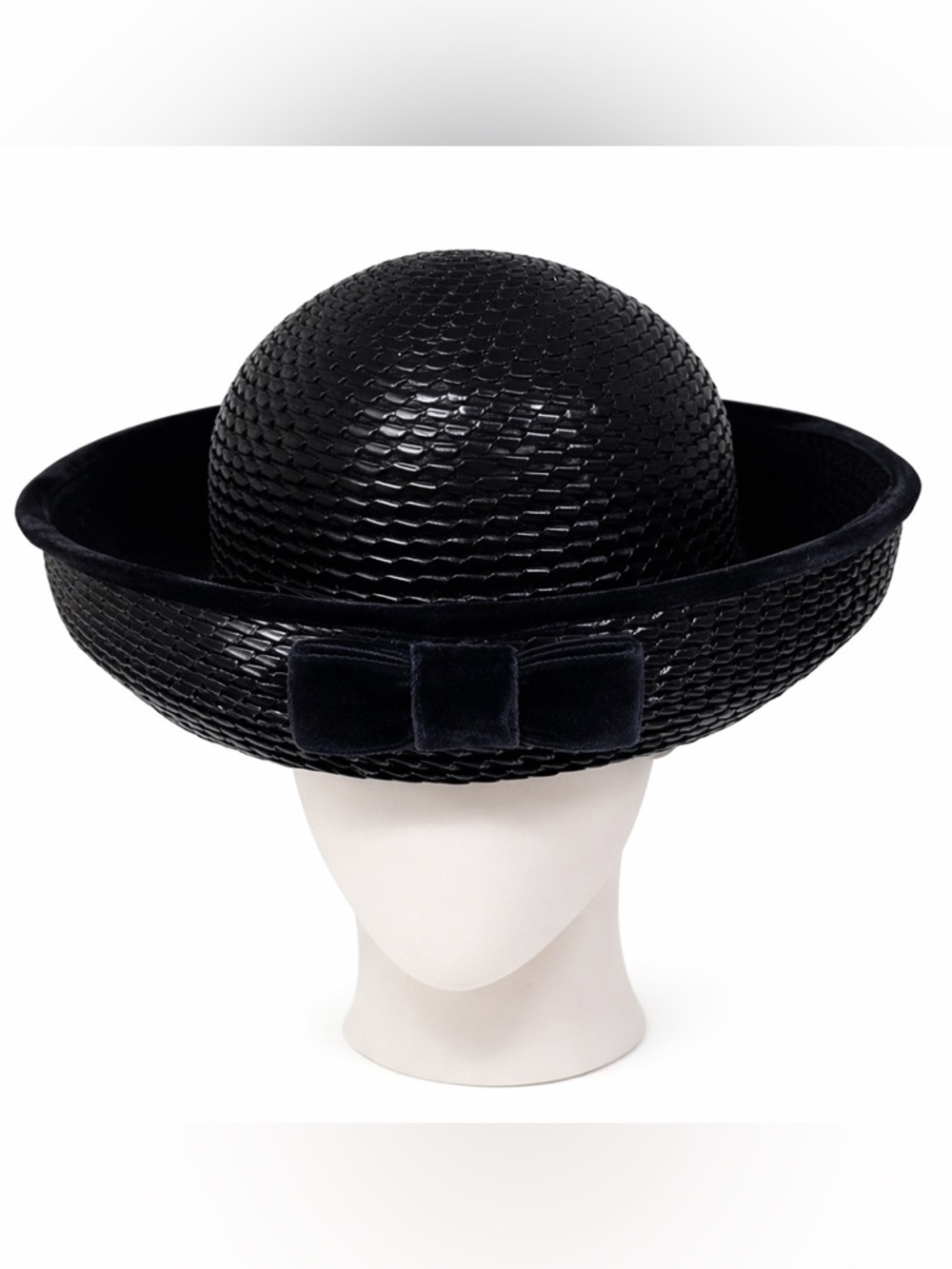 Vintage navy woven hat with velvet bow and trim.